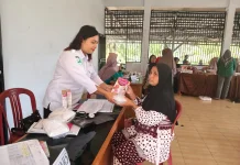 Posyandu Desa Lubuk Sahung Bagikan Susu untuk Bumil, Dukung Kesehatan Ibu dan Janin