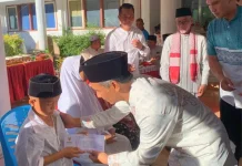 Wakil Bupati Kaur  Menyerahkan Satuan Kepada 100 Anak Yatim Piatu dan Kurang Mampu