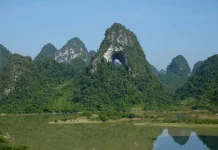 Pesona Gunung Mat Than, Keajaiban Karst Berlubang Alami di Utara Vietnam
