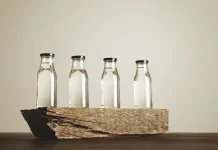 Pemanfaatan Botol Kaca Bekas Menjadi Wadah Bumbu Dapur Unik