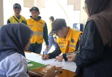 Sebanyak 400 Petugas DLH, Disperumkim dan Perumda Tirta Pakuan Terima Santunan