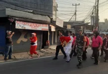Semarakan HUT RI ke 81, Bendera Merah Putih 30 Meter Diarak Keliling Citeureup