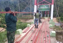 Pembangunan Jembatan Gantung Sungai Rimbang 64,2 Persen