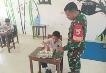 Babinsa Koramil 06 Guguak Dampingi Program Makan Bergizi Gratis SMPN 2