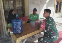 Babinsa Guguak Edukasi Hemat Air Warga