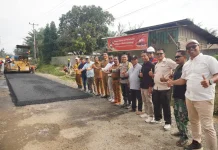 Jalan Poros Koto Gadang Dharmasraya Resmi Diaspal Kembali