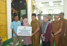 BAZNAS Agam Salurkan Zakat Rp799,6 Juta untuk 390 Mustahik