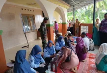 Satgas TMMD Kodim 0304/Agam Dampingi Pengobatan Gratis Warga