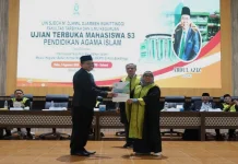 Disertasi tentang BKMT Antarkan Abdul Azis Raih Gelar Doktor di UIN Bukittinggi