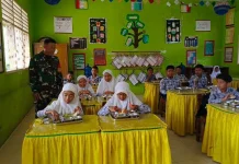 Babinsa Koramil 05 Harau Dampingi Program MBG Di SDN 02 Koto Tuo