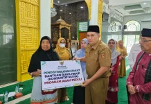 BAZNAS Agam Salurkan Zakat Rp188,78 Juta kepada 92 Mustahik