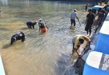 Gotong Royong Bersihkan Balong Girang, Warga Cigugur Jaga Habitat Ikan Dewa