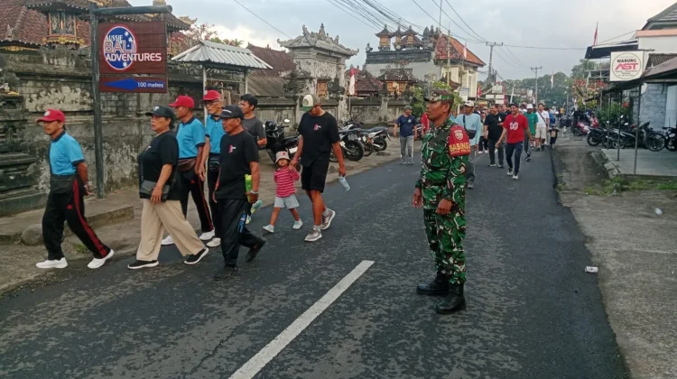 Sinergi TNI-Polri Kawal Jalan Santai HUT GKPB Suluh Kasih dan HUT Kemerdekaan RI