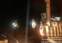 Polsek Bebandem  Menembus Hujan Demi Menjaga Keamanan Wilayah