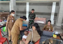 Babinsa Dawan Kaler Dampingi Posyandu ILP Desa