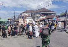 Babinsa Kodim Klungkung Kawal Upacara Ngaben Warga