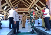 Babinsa Kawal Aksi Sosial TP Posyandu Bali di Dawan