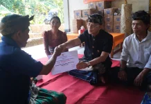 Komitmen Lestarikan Tradisi, Bupati Satria Kucurkan Bantuan Ngaben Massal