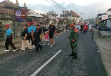 Sinergi TNI-Polri Kawal Jalan Santai HUT GKPB Suluh Kasih dan HUT Kemerdekaan RI