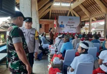 Dandim Klungkung Terjunkan Babinsa Kawal Aksi Sosial
