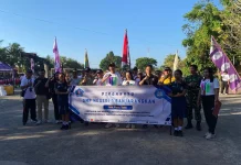 Babinsa Kawal Gerak Jalan HUT SMPN 1 Banjarangkan
