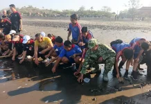 Babinsa Sudimara Hadiri World Cleanup Day di Pantai Yeh Gangga