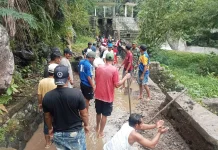 Babinsa dan Warga Hilihintir Gotong Royong Bersihkan Saluran Irigasi