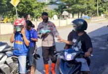 Polsek Wulanggitang Bagikan Masker, Ajak Warga Jaga Kesehatan