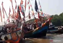 Hundreds of Boats Escort Sacred Sea Offering Ritual in Muaragembong Water