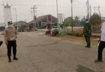 Polsek Bomberay Bersama Puskesmas Bagikan 200 Masker Gratis