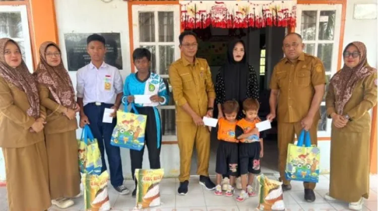 Salurkan Paket Bahagia, Camat Taluditi Minta Warga Teladani Nabi