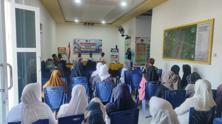 Bhabinkamtibmas Kawal Transparansi APBDes Desa Molombulahe Paguyaman