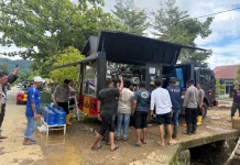 Brimob Polda Gorontalo Kembali Salurkan Air Bersih di Biau Gorontalo Utara