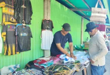 Jauh dari Bandung, Pedagang Merchandise Ikut Berburu Rezeki di PENAS KTNA