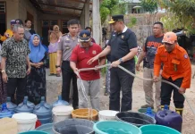 Penyaluran air bersih di Desa Bongohulawa, Kecamatan Bongomeme, Kabupaten Goronta