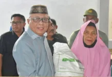Ratusan KK di Tibawa Terima Bantuan CBP Periode Juli-September