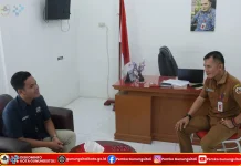 Kominfo Kota Gunungsitoli Perkuat Sinergi dengan PT Pos Indonesia