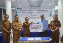 BNI Gunungsitoli Serahkan Bantuan Meubelair untuk 4 Sekolah SD dan SMP di Nisut