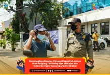 Kelurahan Utan Panjang Bagikan 400 Masker Cegah Dampak Abu Vulkanik