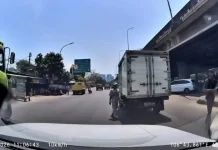 Pungli Pak Ogah terhadap Sopir Truk di Ring Road Kamal Berakhir Damai