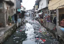 Sampah Kembali Menumpuk di Kali PJT Babelan Bekasi