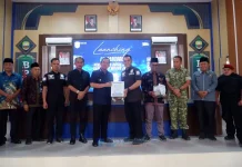 Bupati Muaro Jambi Luncurkan Barcode Kotak Amal dan PUB 2026