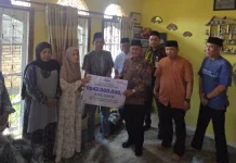 Bukti Nyata Perlindungan Ketua RTSantunan Jaminan Kematian Diserahkan