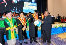 Dirut PT Air Minum Jayapura Entis Sutisna Raih Lektor Kepala Manajemen Keuangan