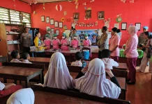 SPPG Polda Papua Menggelar Uji Coba MBG Pola Prasmanan di SD Negeri Inpres Dok VIII