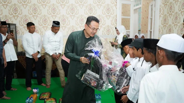Kapolres Bayu Berbagi Kebahagian Ramadhan dengan Yatim
