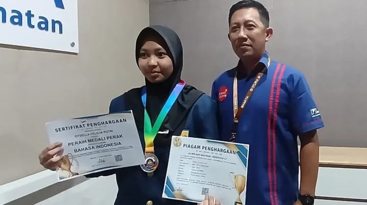Cinta Bahasa Indonesia Antarkan Gyssela Juara Olimpiade Tingkat Nasional