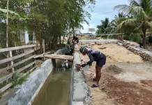 Satgas TMMD Kendari Plester Pondasi Jembatan di Sambuli