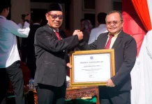 Koltim Dinobatkan Kabupaten Teraktif dalam Harmonisasi Produk Hukum Daerah