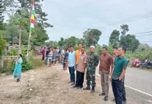Ciptakan Rasa Nyaman Babinsa Amankan Ibadah Minggu di Gereja